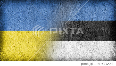 Ukrainian and Estonian flag on concrete 91933271