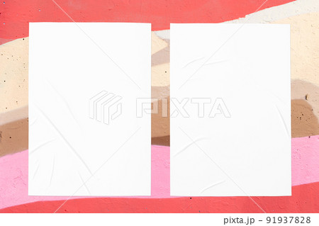 colorful urban wall texture with two wrinkled glued poster templates 91937828