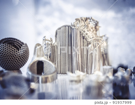 Object printed from metal powder on metal 3d printer.Object printed in laser sintering machine. Modern 3D printer printing from metal powder. Progressive additive DMLS, SLM, SLS 3d printing technology 91937999