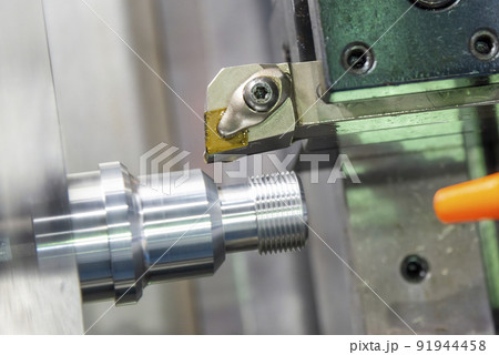 The  CNC lathe machine thread cutting at the end of metal stud parts. 91944458