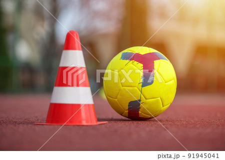 Soccer training equipment on artificial turf. Material for trainning class of football academy. Soccer training equipment on artificial turf. Material for trainning class of football academy. 91945041
