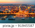 Aerial view of Galati City, Romania. Night city lights after sunset at blue hour 91945587