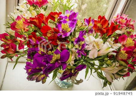 a large bouquet of multi-coloured alstroemerias a large bouquet of multi-coloured alstroemerias 91948745
