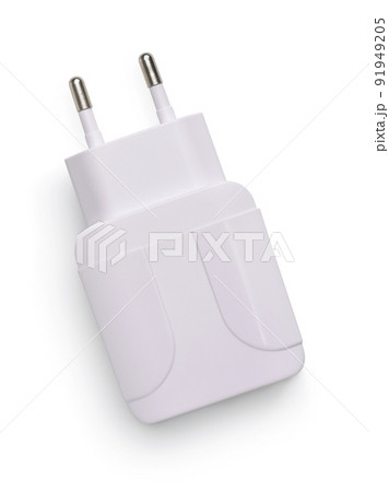 Top view of white plastic electric wall charger plug Top view of white plastic electric wall charger plug 91949205