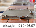 Close-up of spoon on the set table 91949367