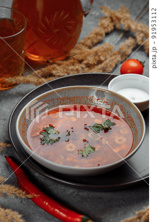 Traditional russian Solyanka or saltwort soup. Selective focus. photo for the menu, traditional food 91953112