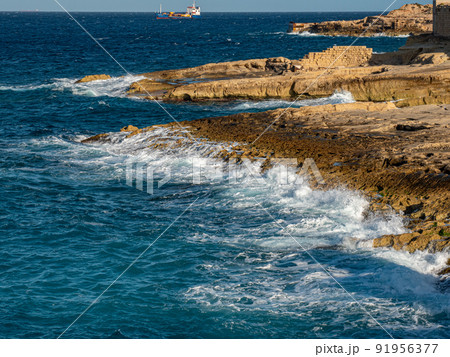 Blue water at the coast of Malta 91956377