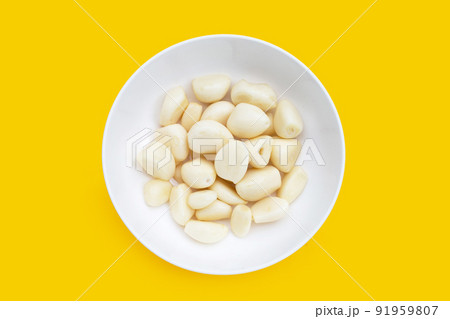 Fresh garlic on white background Fresh garlic on white background 91959807