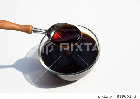 Oyster sauce on white background. Oyster sauce on white background. 91960343