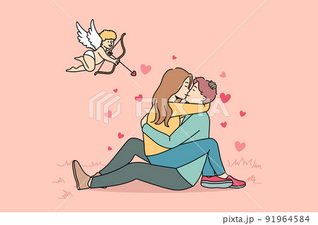 Cupid shooting at couple in love Cupid shooting at couple in love 91964584