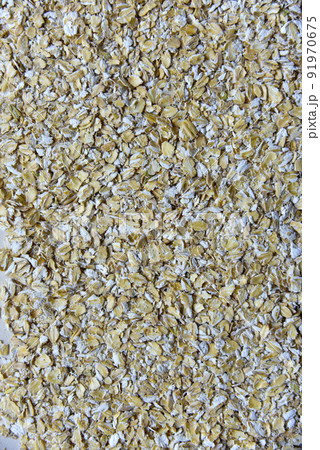 Oatmeal close-up on a white background Oatmeal close-up on a white background 91970675
