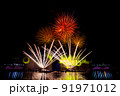 Beautiful fireworks in the night sky. 91971012