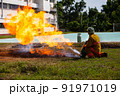 Firefighter with fire and suit for protect fire fighter for training firefighters. 91971019