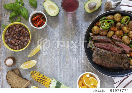 American lunch fried piece of meat and potatoes American lunch fried piece of meat and potatoes 91973774