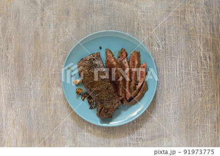 juicy steak with blood fried in a pan juicy steak with blood fried in a pan 91973775