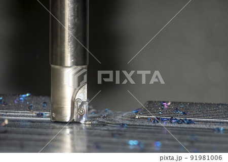 Close up scene the CNC milling machine rough cutting the injection mold parts by indexable tools. 91981006