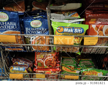 SELANGOR, MALAYSIA -JULY 3, 2021: Selective focused on various types of spice powders that have been packed in commercial packs. Sorted by brand and type. Labeled with a price tag. SELANGOR, MALAYSIA -JULY 3, 2021: Selective focused on various types of spice powders that have been packed in commercial packs. Sorted by brand and type. Labeled with a price tag. 91981821