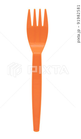 Orange plastic fork isolated on white background 91982581