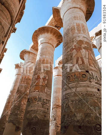 Ancient ruins on an abandoned temple with columns full of hieroglyphs in Egypt Ancient ruins on an abandoned temple with columns full of hieroglyphs in Egypt 91983504