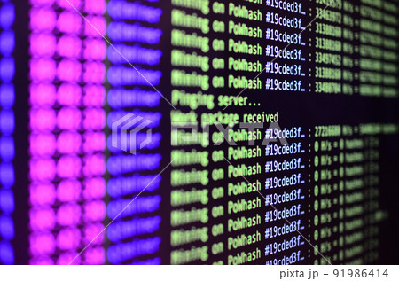 Macro snapshot of the program interface for crypto currency mining on the monitor of an office computer. The concept of mining bitcoins. The flow of information strings and data 91986414