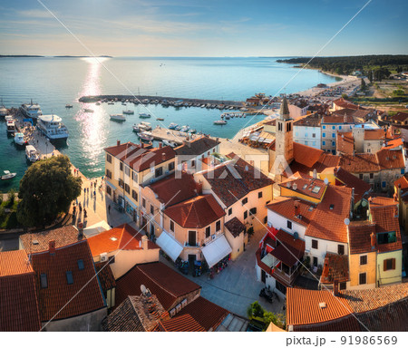 Aerial view of beautiful old city, colorful houses, boats 91986569