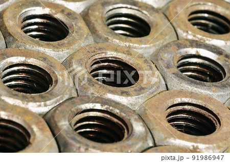 Close-up of rusty nuts Close-up of rusty nuts 91986947
