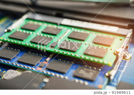Repairing and upgrade circuit mainboard of notebook, electronic, computer hardware and technology concept. Repairing and upgrade circuit mainboard of notebook, electronic, computer hardware and technology concept. 91989611