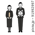 喪主を務める男女 91992997