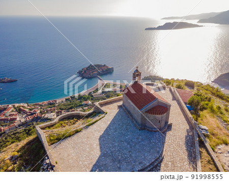 The Church of St. Sava in Montenegro, near the island of Sveti Stefan near Budwa. Drone view. Location: church St. Sava, Montenegro, Balkans, Adriatic sea, Europe 91998555