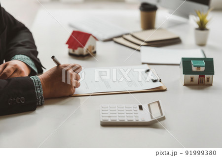 Real estate concept. Business woman sign in agreement contract. Real estate concept. Business woman sign in agreement contract. 91999380