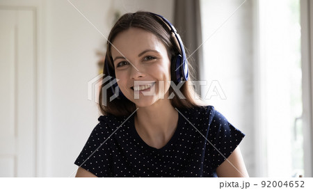 Cheerful happy student girl, blogger, online teacher head shot portrait 92004652