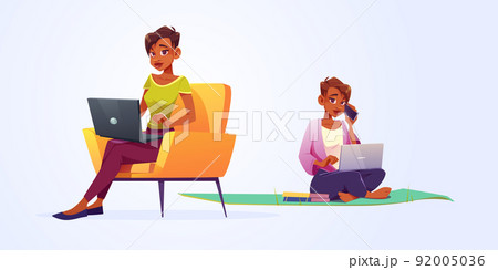 Woman work on laptop sitting on mat and chair. 92005036