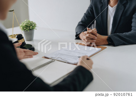Good service cooperation, Consultation of Businesswoman and Male lawyer or judge counselor having team meeting with client, Law and Legal services concept. 92010761