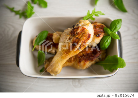 grilled chicken legs fried with spices and herbs 92015674