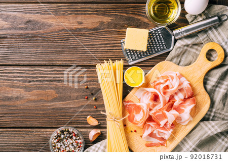 A set of products pasta carbonara pasta, dark wooden background, rustic style. Flat lay copy space A set of products pasta carbonara pasta, dark wooden background, rustic style. Flat lay copy space 92018731
