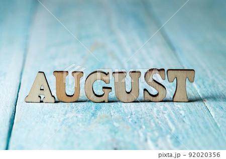 The month of August is large on a blue background. Calendar months. The names of the months for the calendar. The month of August is large on a blue background. Calendar months. The names of the months for the calendar. 92020356