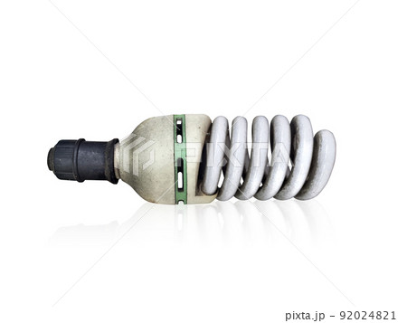 Old technology and wasting electricity, burned out light bulb 92024821