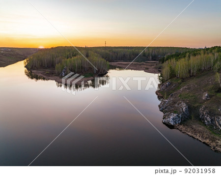 Confluence of the Iset and Kamenka rivers in the city Kamensk-Uralskiy. Iset and Kamenka rivers, Kamensk-Uralskiy, Sverdlovsk region, Ural mountains, Russia. Aerial view Confluence of the Iset and Kamenka rivers in the city Kamensk-Uralskiy. Iset and Kamenka rivers, Kamensk-Uralskiy, Sverdlovsk region, Ural mountains, Russia. Aerial view 92031958