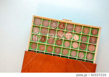 Coin case with numismatic collection of antique coins. Plastic and wooden numismatic album. Coin case with numismatic collection of antique coins. Plastic and wooden numismatic album. 92037220