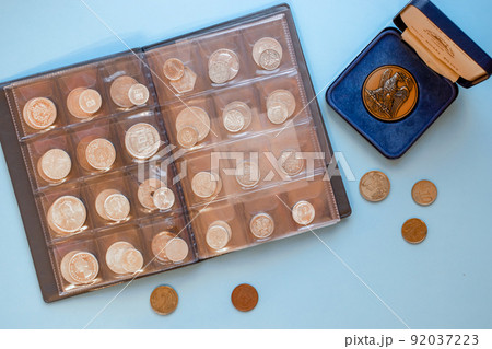 Numismatics. Old and expensive ancient collectible coins made of silver, gold and copper  92037223