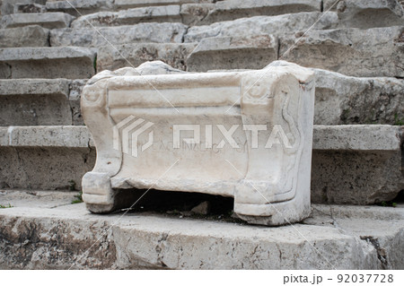 Ancient stone seat in the amphitheatre in Athens, Greece 92037728