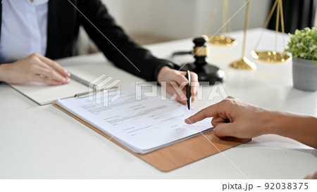 Cropped, A professional female business lawyer is having a meeting in the office Cropped, A professional female business lawyer is having a meeting in the office 92038375