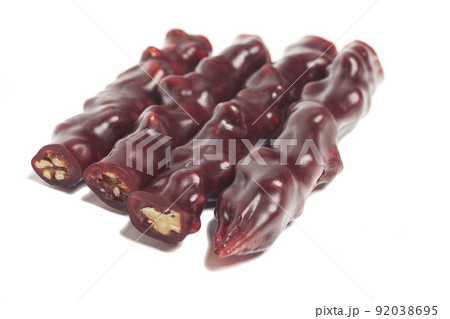 National caucasian dessert churchkhela isolated on a white background. 92038695