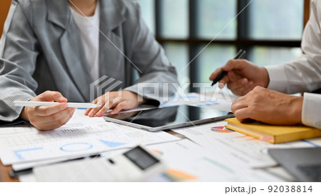A business financial team working together, having a financial meeting A business financial team working together, having a financial meeting 92038814