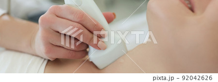 Ultrasound scanning diagnostic for woman of thyroid gland in hospital 92042626