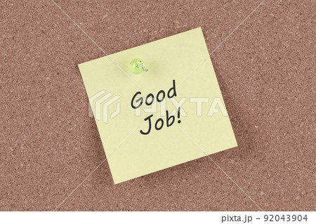 Good job post note on a cork notice board 92043904