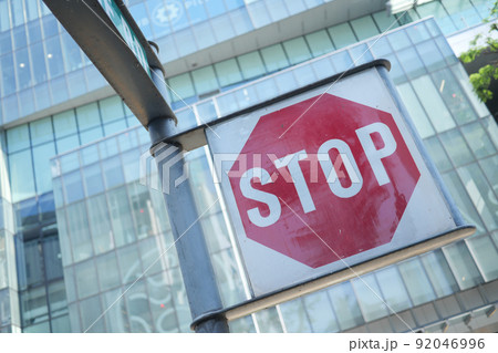 Stop sign in a empty road Stop sign in a empty road 92046996
