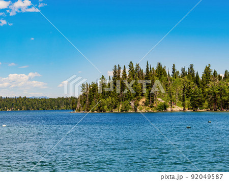 Sunny view of the Jenny Lake landscape in Grand Teton National Park Sunny view of the Jenny Lake landscape in Grand Teton National Park 92049587