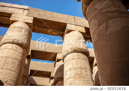Different hieroglyphs on the walls and columns in the Karnak temple. Karnak temple is the largest complex in ancient Egypt. 92052658
