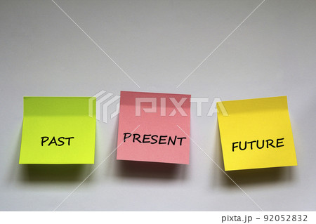 "Past, present, future", the phrase is written on multi-colored stickers on white background "Past, present, future", the phrase is written on multi-colored stickers on white background 92052832